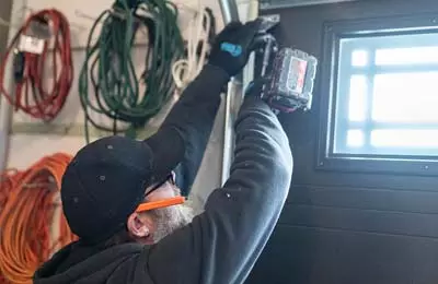 garage door maintenance Le Roy technician