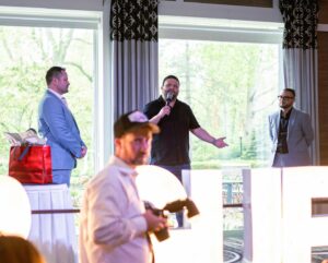 Bari giving speech at be our guest event