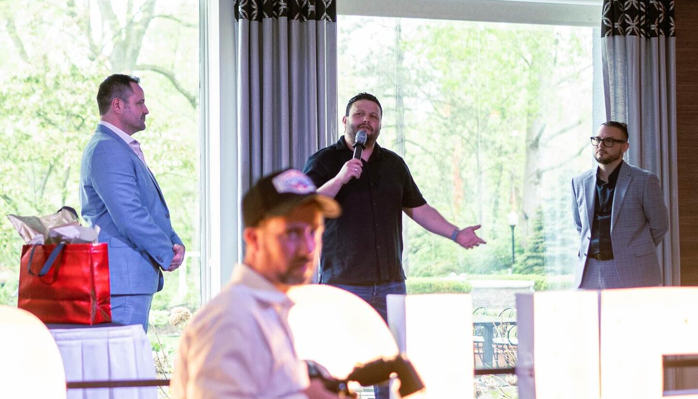 Bari giving speech at be our guest event