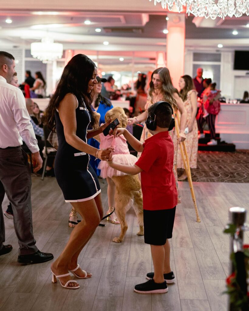 dancing on dance floor, adults and children