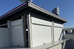 716GarageDoor technician performing garage door spring repair in Lawtons