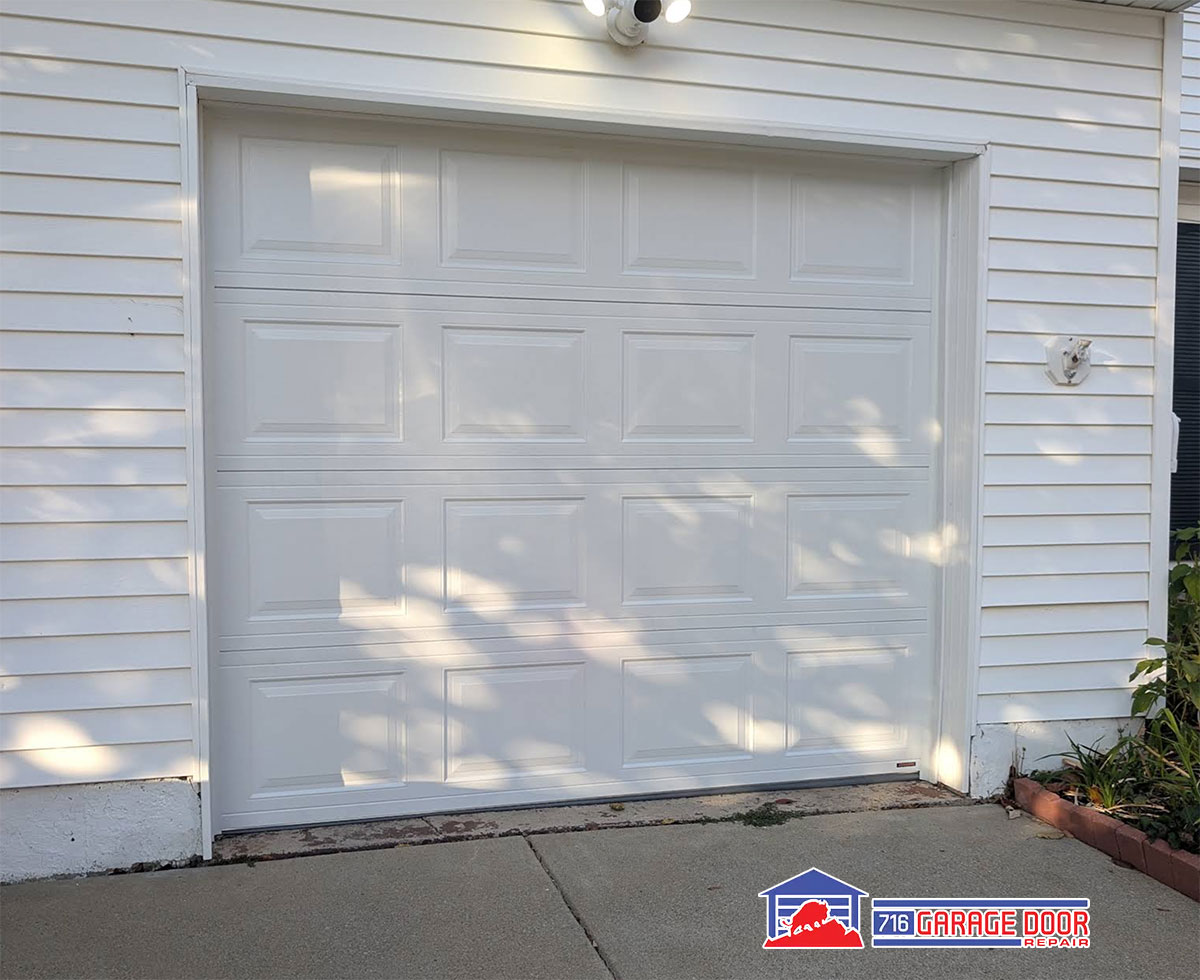 newly repaired garage doors in local home done by 716 team 