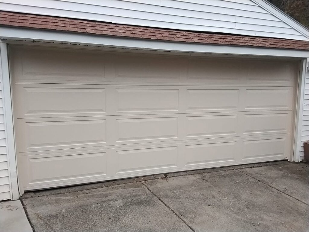 new garage door - traditional raised panel design