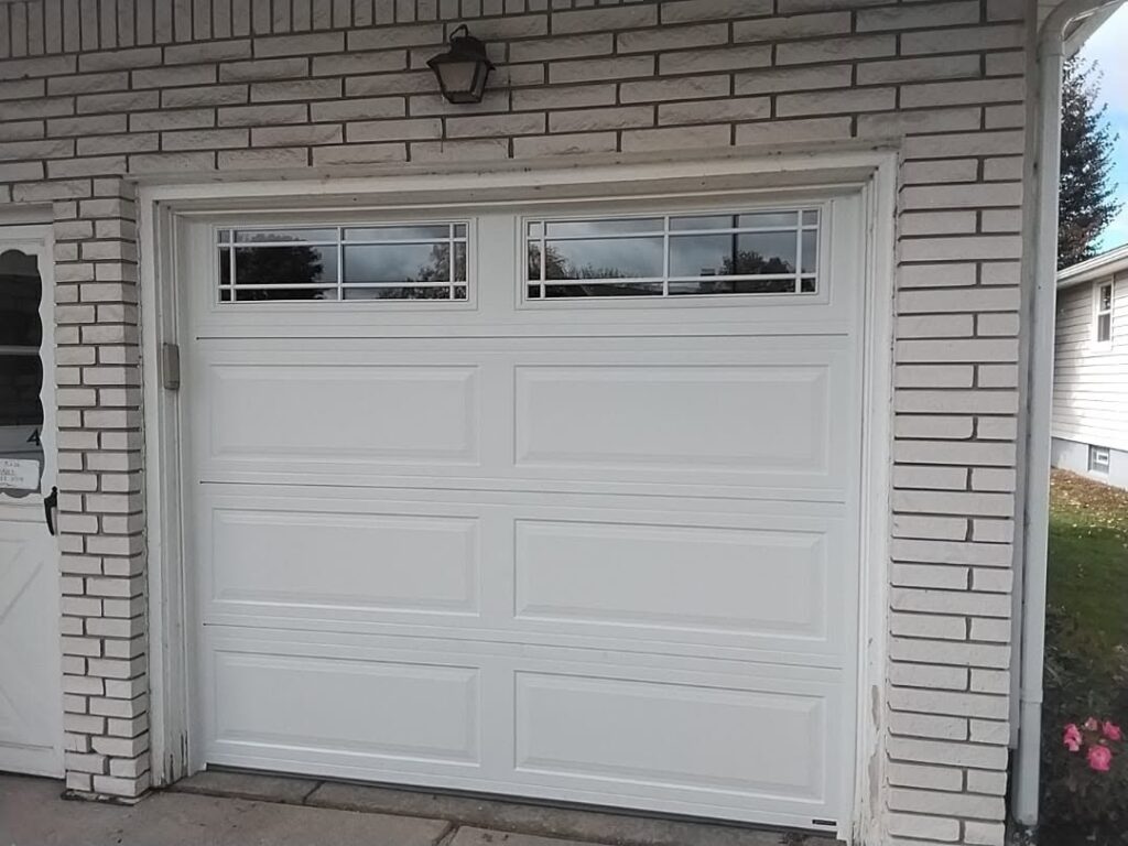new white garage door with window inserts